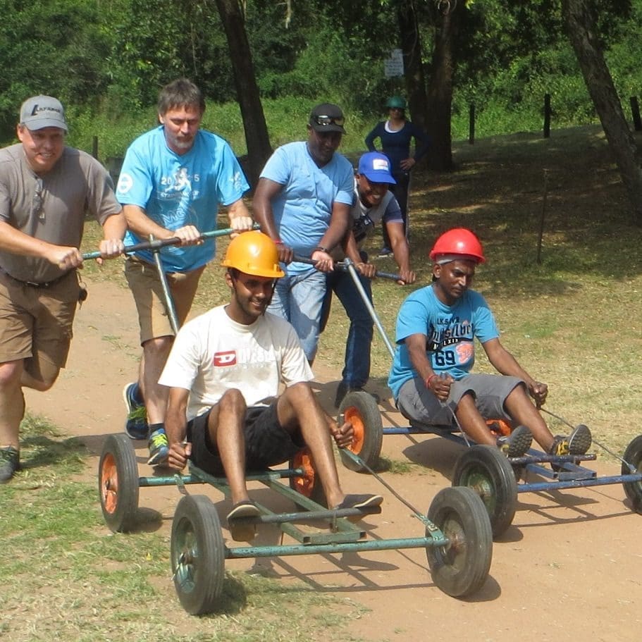 Men pushing carts