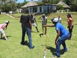 People pointing in field